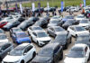 Nigeria’s Auto Market Shifts Toward Hybrid, Tech-Focused SUVs at Abuja Fair Rows of new hybrid and electric SUVs on display at the Abuja Motor Fair