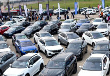 Nigeria’s Auto Market Shifts Toward Hybrid, Tech-Focused SUVs at Abuja Fair Rows of new hybrid and electric SUVs on display at the Abuja Motor Fair
