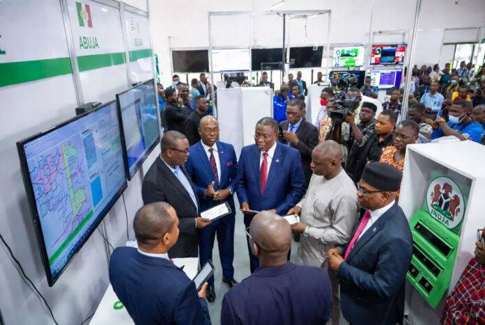 INEC: Technology Ends Electoral Fraud INEC officials and citizens celebrate the unveiling of biometric voting machines and digital result systems in Abuja.