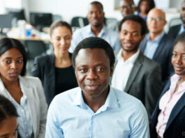 Diverse Nigerian professionals in a meeting discussing fintech regulation, with subtle green-white-green Nigerian flag overlay