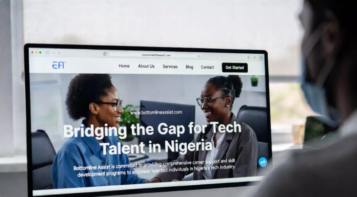 Bottomline Assist Bridges Gap for Tech Talent in Nigeria Nigerian tech founder and recruiter smiling at a large monitor displaying the Bottomline Assist platform with the headline “Bridging the Gap for Tech Talent in Nigeria” and profiles of skilled developers.