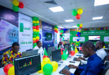LemFi Launches USD & GBP Global Accounts in Nigeria Excited Nigerians at a colourful launch event with green, white and yellow balloons, using laptops to open LemFi USD and GBP global accounts on the app.