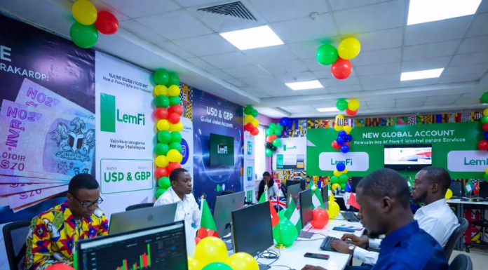 LemFi Launches USD & GBP Global Accounts in Nigeria Excited Nigerians at a colourful launch event with green, white and yellow balloons, using laptops to open LemFi USD and GBP global accounts on the app.