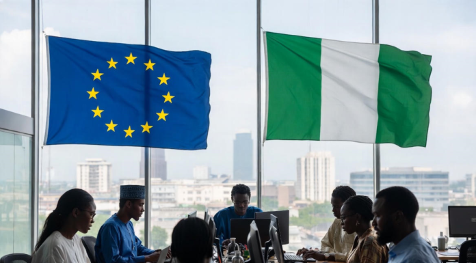 EU Commits €45 Million to Boost Nigeria’s Digital Economy Nigerian and European officials in a modern conference room with EU and Nigerian flags, collaborating on laptops against a Lagos city skyline, symbolising partnership in digital innovation.