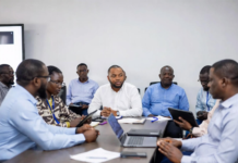 Lagos Government Partners with Russia to Enhance Energy and Technology Sectors Lagos State Governor and Russian officials shaking hands in front of Nigerian and Russian flags, with digital overlays of power grids, renewable energy plants and smart city technology.
