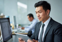 Bottomline Assist Bridges Gap for Nigerian Companies Seeking Tech Talent Nigerian tech recruiters and company founders smiling while reviewing profiles of pre-vetted software engineers, data scientists and product managers on laptops in a modern Lagos office.