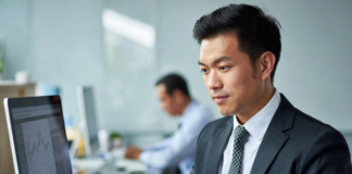Bottomline Assist Bridges Gap for Nigerian Companies Seeking Tech Talent Nigerian tech recruiters and company founders smiling while reviewing profiles of pre-vetted software engineers, data scientists and product managers on laptops in a modern Lagos office.