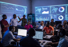 Nigerian cybercrime investigators and law enforcement officers wearing headsets in a futuristic command centre, tracking dark-web trafficking networks and cryptocurrency trails on massive glowing screens.